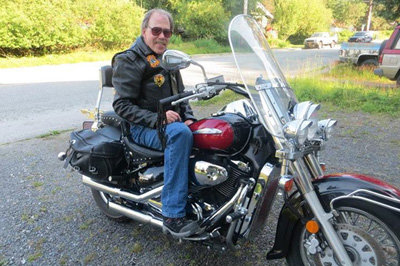Alaskan grocer Miker Cooper takes a 20-hour ferry ride and rode his motorcycle 2,040 miles to the 75th Sturgis Biker Rally.