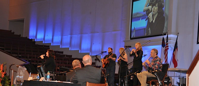 Kristyn Getty, far left, leads in special music along with her husband, Keith (not shown) at the opening session of the convention on Monday night. JOE WESTBURY/Index