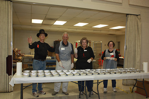 Members of First Baptist Church in Duluth prepare an annual Thanksgiving meal delivered to local families. FB DULUTH/Special