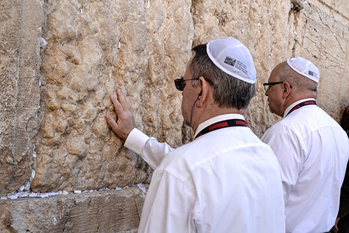 Steve Hamlin of Rhine Baptist and Keith Chandler, state missionary in Music and Worship Ministries, bring petitions to the Western Wailing Wall in the Old City of Jerusalem. EDDY OLIVER/GBC