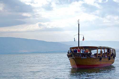 The group takes a boat excursion out in the Sea of Galilee. EDDY OLIVER/GBC