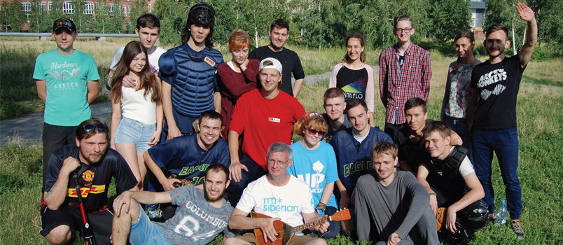 Novosibirsk youth surround Georgian Mike Campbell, at front in the center, following a practice session in their Siberian city.