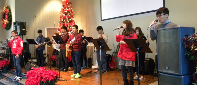 Teens at Se Kwang Baptist Church sing during a worship service Dec. 5 with other Asian American church leaders and students. GERALD HARRIS/Special