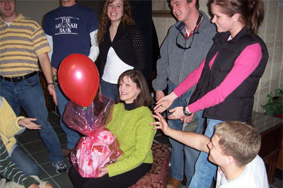 Students from the Georgia Southern University BCM gather around a recipient of a Singing Valentine. GSU BCM/Special