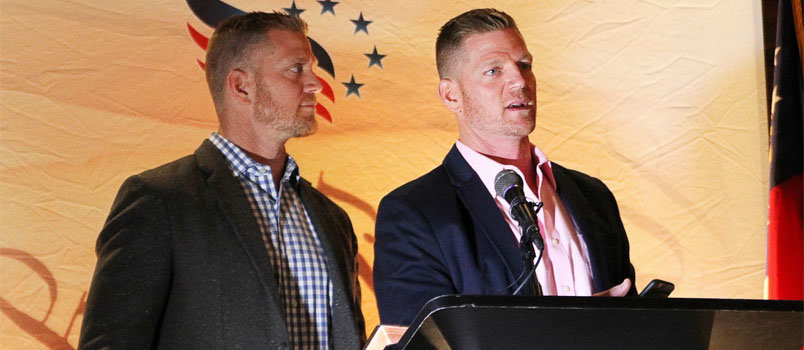 David and Jason (pink shirt) Benham address the crowd at the Religious Freedom Breakfast held yesterday at the 1870s Atlanta Railroad Freight Depot. The brothers' conservative views on marriage led to the end of their relationship with HGTV despite their successful show "Flip It Forward." BRYAN NOWAK/Special