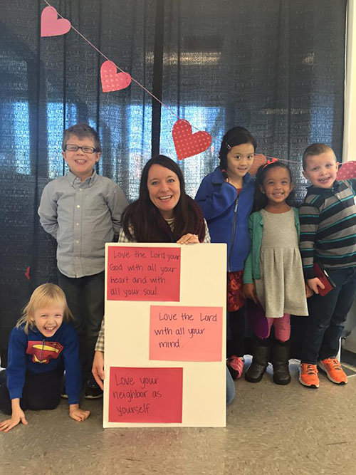 Children's ministry leader Katie Thompson, wife of Pastor Patrick Thompson, stands with elementary age children at New City Church yesterday. NEW CITY/Special