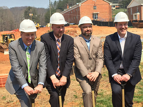 Left to right, Joseph Wiegand, vice president for Finance and Operations; Brad Reynolds, vice president for Academic Services; President Emir Caner; and Chris Appling, vice president of Student Services and Athletics, take part in the groundbreaking ceremonies for Truett-McConnell College's new student center. GERALD HARRIS/Index