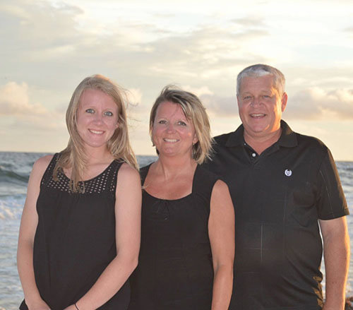 Shoal Creek Baptist Pastor Stacy Dyer stands with his wife, Diane, and daughter, Lindsey, on a recent family getaway. DYER FAMILY/Special