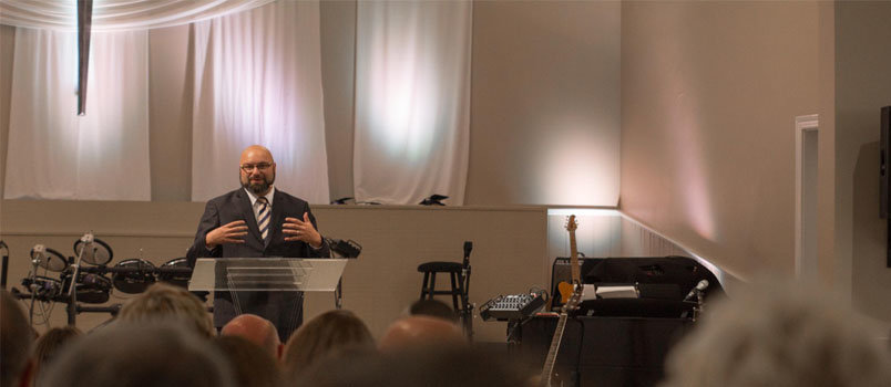TMC President Emir Caner addresses the congregation of the Cleveland Worship Center on the lease/purchase agreement of the church property. TMC SPECIAL/Index