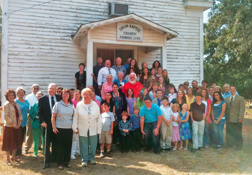 On Sept. 18 a group of students from Shiloh Baptist Church in Newborn led worship at Shiloh Baptist Church in Greensboro, a restart that originally began meeting in 1795. Students from Newborn months earlier had assisted in construction projects at the aging church. At left holding a cane is Shiloh-Greensboro Pastor Norman Waldrip while Shiloh-Newborn Student Pastor Paul Miller is at the far right. JASON PRICE/Special