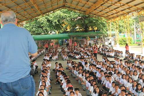 In the Philippines, schoolchildren sit attentively as Malhotra speaks about Jesus. NARESH MALHOTRA/Special