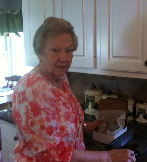 Phyllis Grizzle prepares another batch of brownies to be delivered to a local family. 