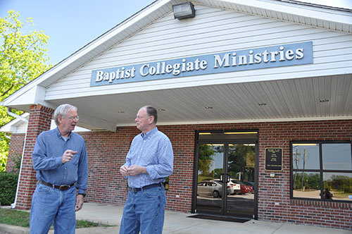 Tony Gray, left, outgoing campus minister at Columbus State University, talks with incoming minister Rick Jenkins outside the BCM center. Gray transfers on May 13 to Georgia Gwinnett College in Lawrenceville. JOE WESTBURY/Index