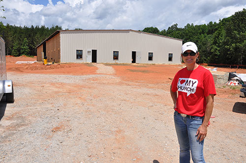 Holly Hayes, Church 213 building team leader, says the church is on schedule for a Sept. 18 dedication. JOE WESTBURY/Index 