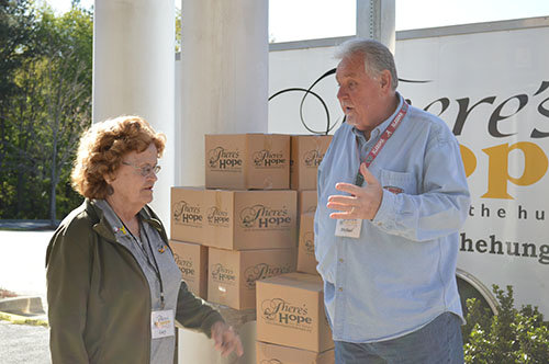 Michael Brown, right, co-director of the There’s Hope for the Hungry mobile food ministry – which serves 31 locations in North Georgia – talks over plans with Lucy Anderson, a ministry volunteer at Bear Creek First Baptist Church in Winder. THERE'S HOPE FOR THE HUNGRY/Special