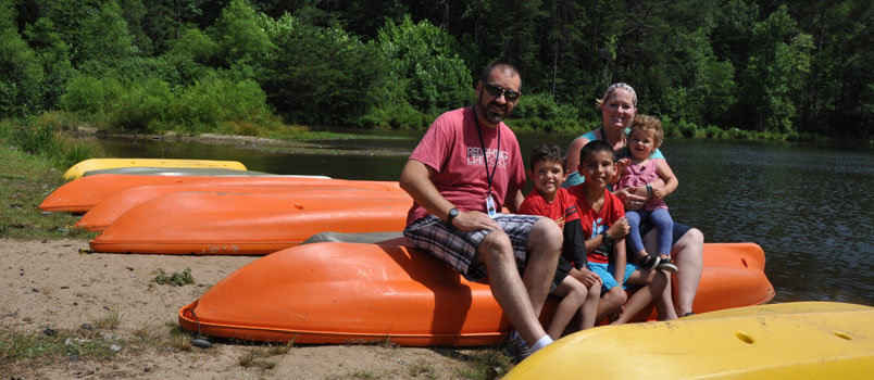 Bryan Catherman and his family – Daniel, Asher, and spouse Lisa holding Lydia – were the guest missionaries during a Culture Camp week in June at Camp Pinnacle. JOE WESTBURY/Index