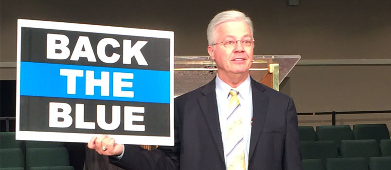 Wayne Robertson, pastor of Morningside Baptist Church in Valdosta, urges his flock to display "Back the Blue" signs to support local law enforcement officers. SCOTT SMITH/Truett-McConnell College