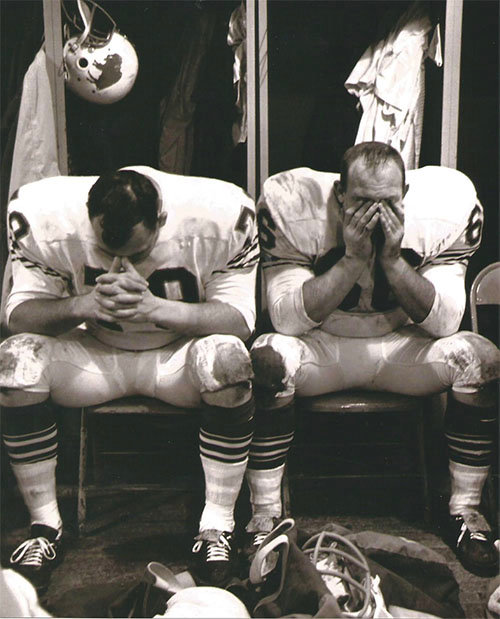 Dick Hudson, 79 and Billy Shaw, 66, participate in a team prayer after a hard fought game. BILLY SHAW/Special