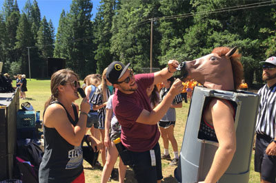  A BCM summer missionary interviews a horse at one of the many competitive events at Elevate Camp. JOE WESTBURY 