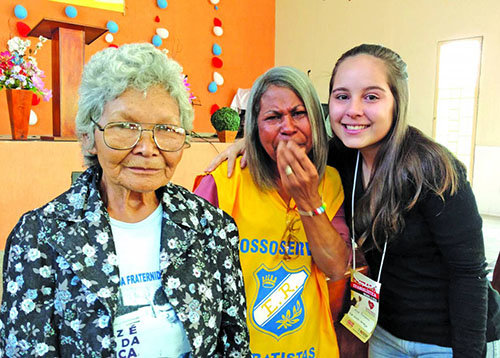 A church helper and a volunteer interpreter react with tears of joy upon learning an elderly woman could now see with the help of donated prescription eyeglasses fitted by Sue Johns, a member of First Baptist Church in Graceville, FL, and mother of Brent Johns, administrative and discipleship pastor at First Baptist Church in Houma, LA. BP/Special