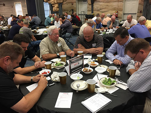 Pastor's at prayer, left to right, include Jeff Overton, Will Murray, and Terry Perryman, who serve at Beulah Baptist Church in Douglasville; Chris Lockhart, of Picketts Mill Baptist Church in Dallas; and Marty McClain and Tyler Brown, of West Hills in Villa Rica. GERALD HARRIS/Index