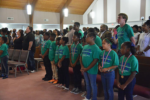 Family members take part in a final ceremony for Cornerstone's Summer Enrichment Camp as students prepare to go back to school. CORNERSTONE BC/Special