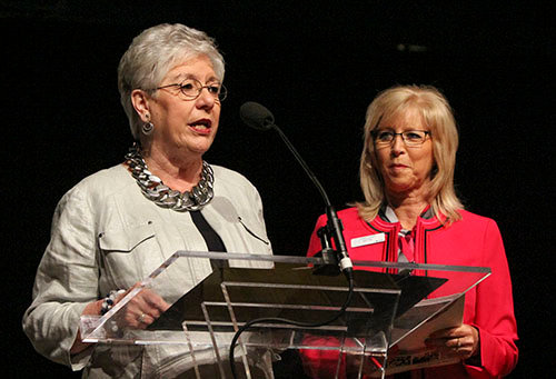 Retiring Woman's Missionary Union (WMU) Executive Director Wanda Lee gives the WMU report with Linda Cooper, president of the national WMU, during the annual meeting of the Southern Baptist Convention Wednesday, June 15 in St. Louis. VAN PAYNE/Special