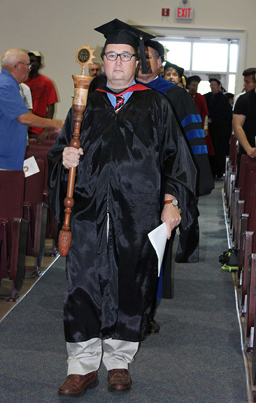 Brewton-Parker Faculty Grand Marshal Dr. George Mosley leads the processional during Fall Convocation on Aug. 30. SARAH BULLARD/Special