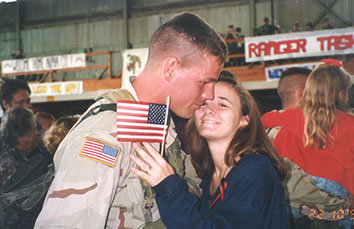 Jeff Struecker hugs his wife, Dawn, in 1993 immediately after his return from the operation in Somalia that would become the basis for the movie "Black Hawk Down." JEFF STRUECKER/Special