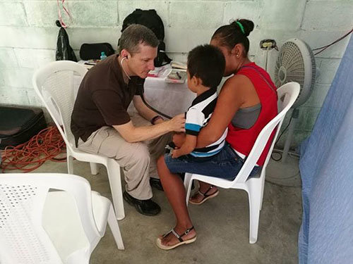 Dr. Grant Eudy attends a patient in the medical clinic. KATHY EUDY/Special