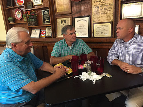 Josh Stafford, right, visits with his mentor Jack Lee, middle, and evangelist Len Turner, who recently preached in revival services for both pastors in Jesup. GERALD HARRIS/Index