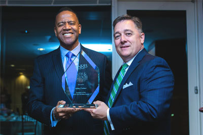 National Religious Broadcasters President Jerry A. Johnson, right, presented the 2016 Faith & Freedom Award to former Atlanta Fire Chief Kelvin Cochran, whose employment was terminated last year by the mayor because of his Christian faith and beliefs. NRB/Special