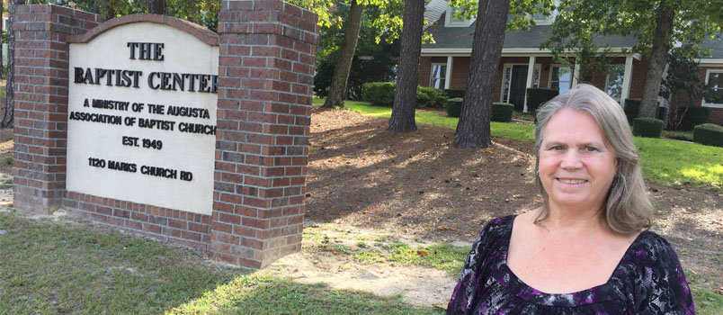 Cyndy Lifsey lived through the decline of Glenn Hills as church secretary and now is living through its relaunch in her role as administrative assistant at the Augusta Association. JOE WESTBURY/Index