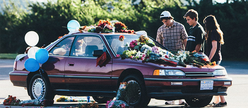 In one of the more heart-wrenching scenes of "I'm Not Ashamed" Rachel Scott's red Acura becomes a memorial site after the horrific 1999 shootings at Columbine High School in Littleton, CO. Twelve students and a teacher died in the attack before the shooters took their own lives. IMNOTASHAMEDFILM.COM/Special