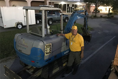Gary Verhulst stands with a track hoe after arriving back at the Savannah Baptist Center late Sunday night. Like Goff, he had just ended a long day helping victims of Hurricane Matthew put their lives back together. Verhulst, a member of Grove Level Baptist Church in Marysville, believes the ministry is one of Georgia Baptists' strongest examples of living out the gospel. He served twice in the Gulf Coast after Hurricane Katrina and in Haiti, the Kentucky ice storm, and recent flooding in Louisiana and South Carolina. JOE WESTBURY/Index