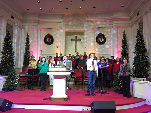 Scott Eaton leads in worship at First Baptist Church in Ellijay as the choir and congregation sing “O Come, O Come, Emmanuel." Churches like FBC Ellijay all across Georgia are beautifully decorated for the Christmas season. JOEY LYLES/FB Ellijay