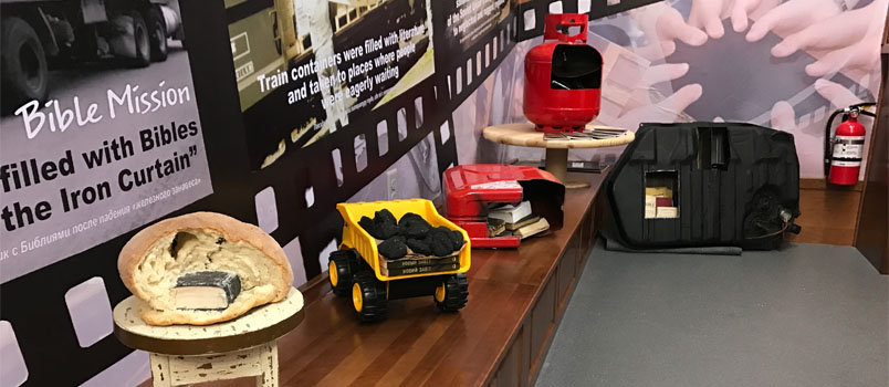 The Bible Truck currently on nationwide tour features a display of the ways Bibles were smuggled into communist nations in recent years ... including being baked into a loaf of bread, far left. JOE WESTBURY/Index
