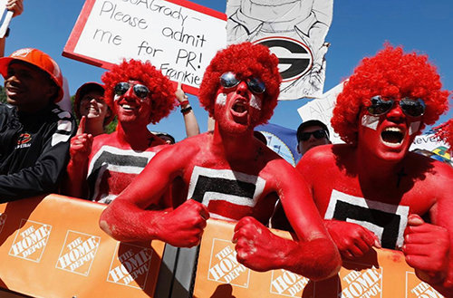 Fan flexing at College Gameday.