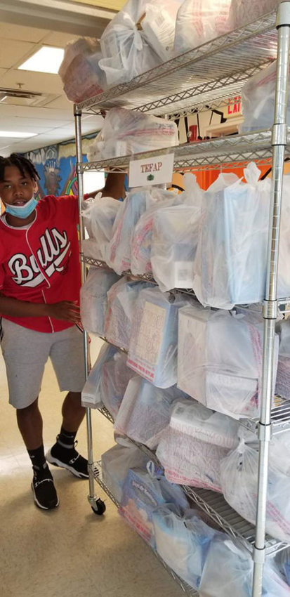  volunteer prepares groceries