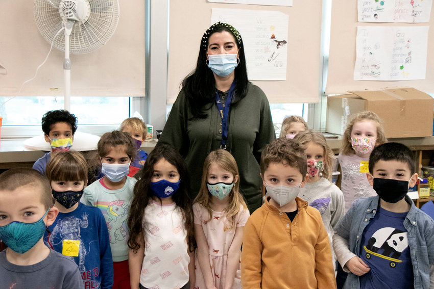 New Nayatt School Principal Melissa Moniz stands with a group of kindergartners last week.