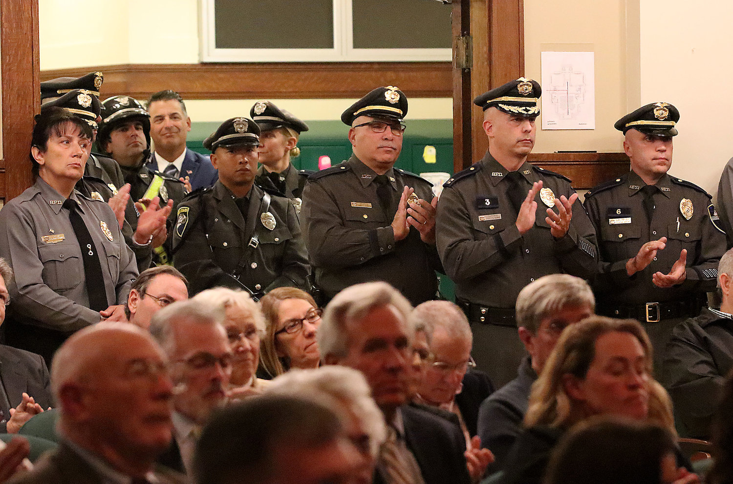 Bristol police officers applaud at the swearing-in ceremony for Chief Kevin Lynch, back in 2019.