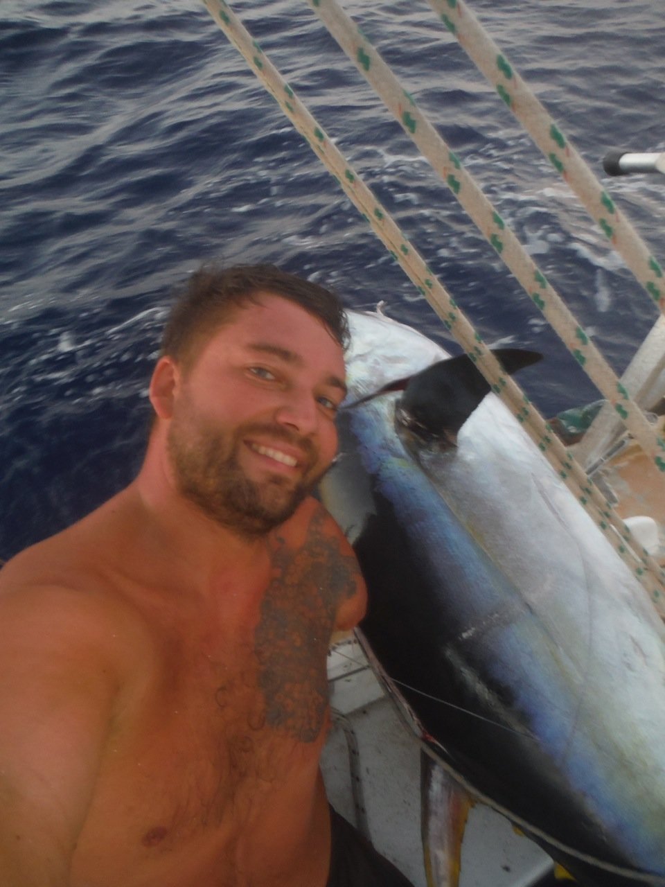 This 200-pound tuna took Dustin four hours — and two gaff hooks — to land.