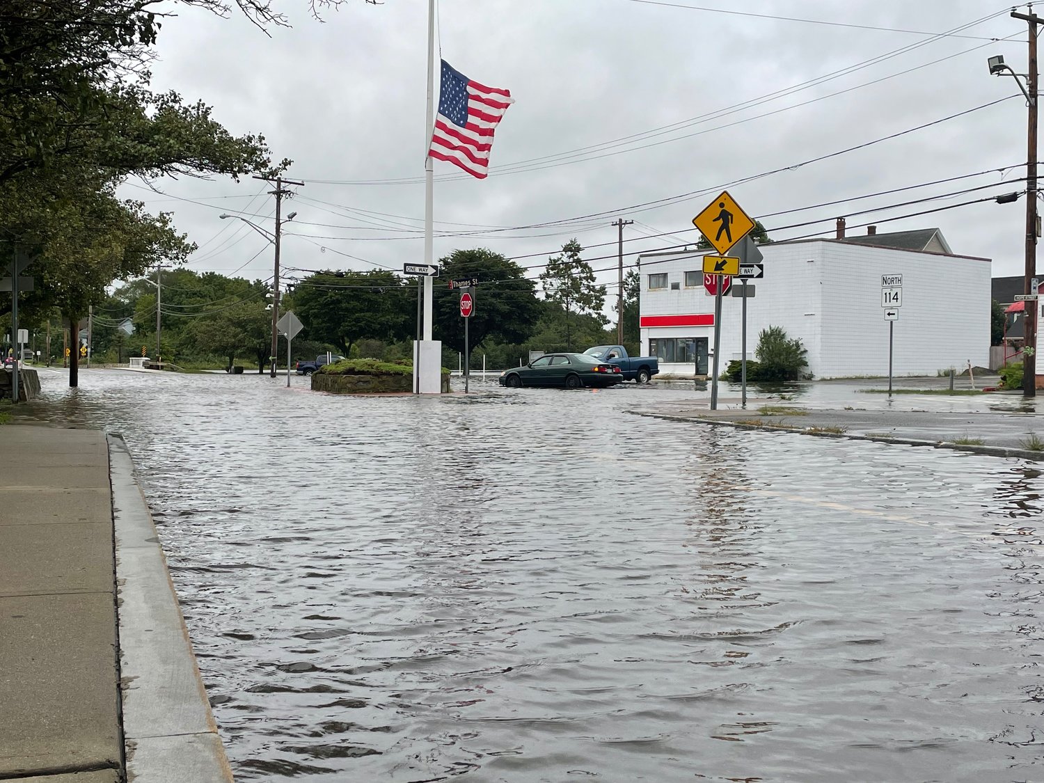 The intersection of Hope and Washington Streets under several inches of water on Thursday morning.