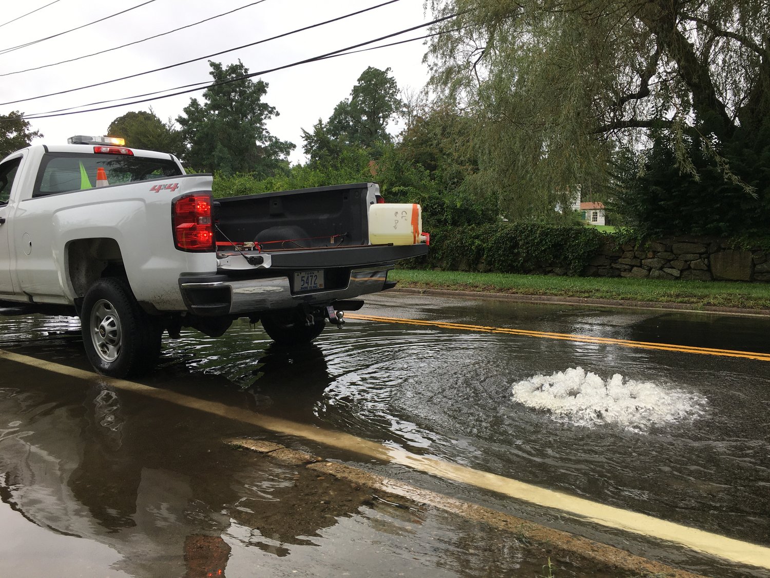 A Bristol Water Pollution Control crew was dripping chlorine into the streets as a way to help treat the untreated sewage and groundwater overwhelming the system.