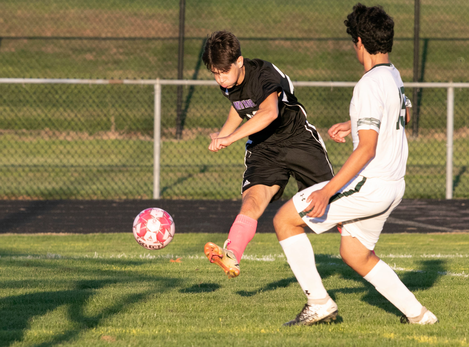 Sophomore winger, Jesse Wilson blasts a shot on goal in the second half.