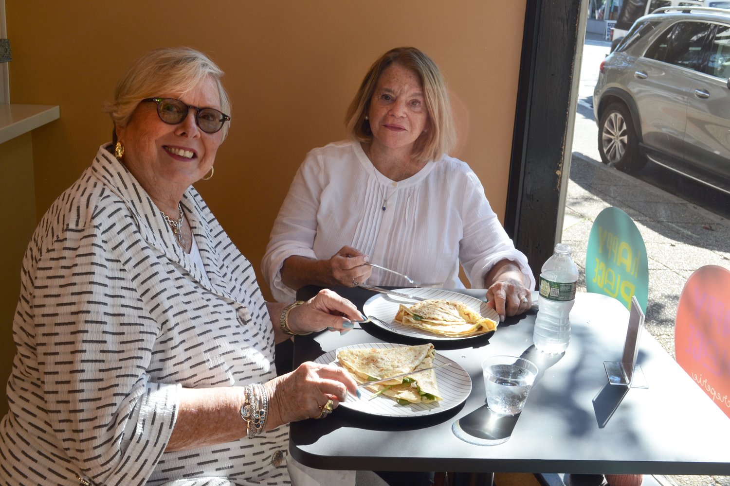 Audrey Field and Susan Maloney each enjoyed a savory crepe consisting of turkey, brie and spinach at Happy Place Creperie on Friday afternoon.