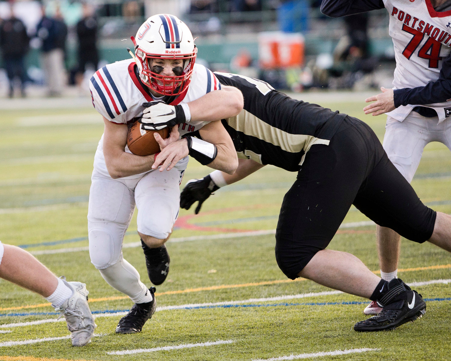 Benny Hurd dives toward the goal line to score the Patriots’ lone touchdown against North Kingstown during the Division I semifinals.