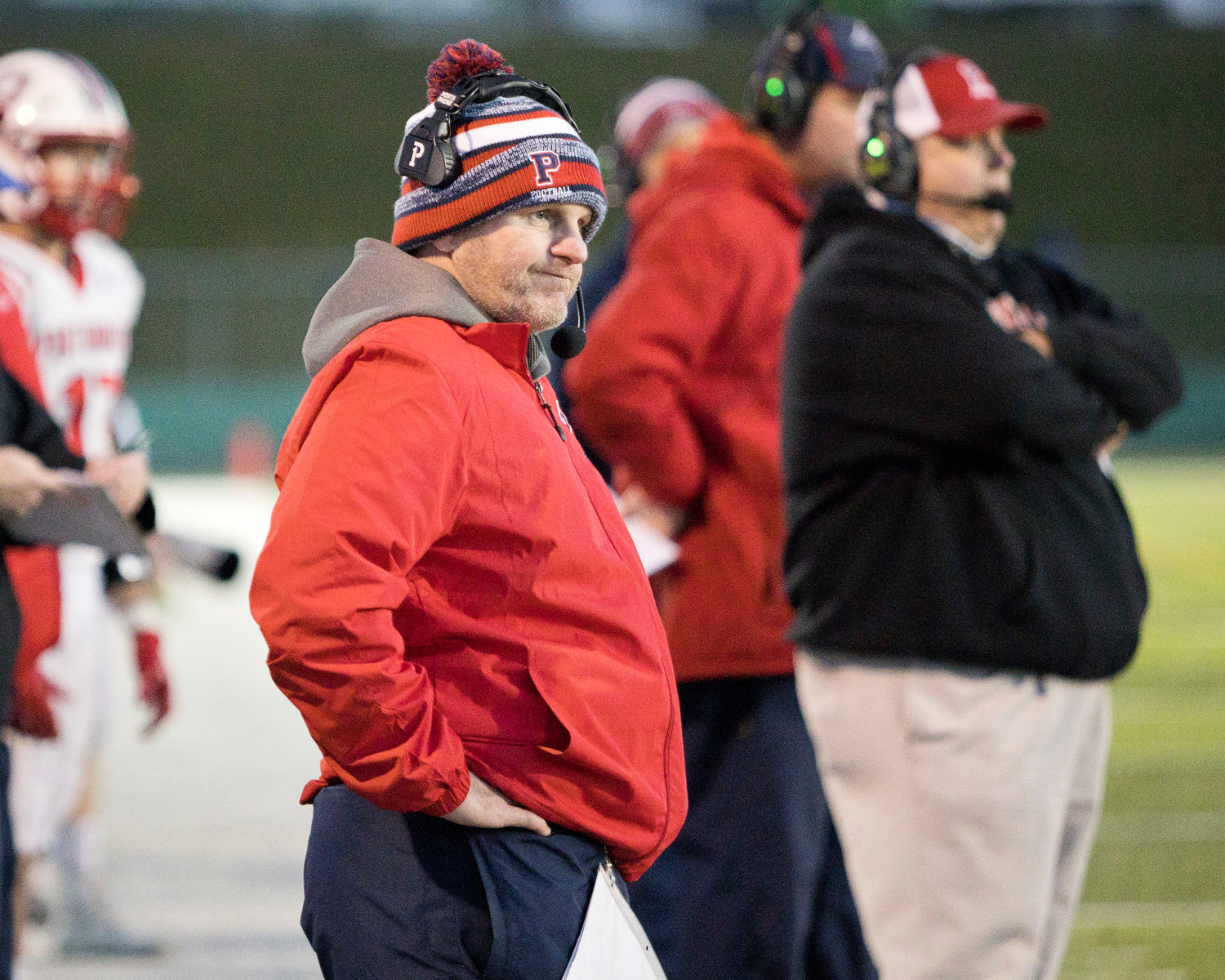 Patriots’ head coach Dustin Almeida can only watch from the sidelines as his team loses to North Kingstown.