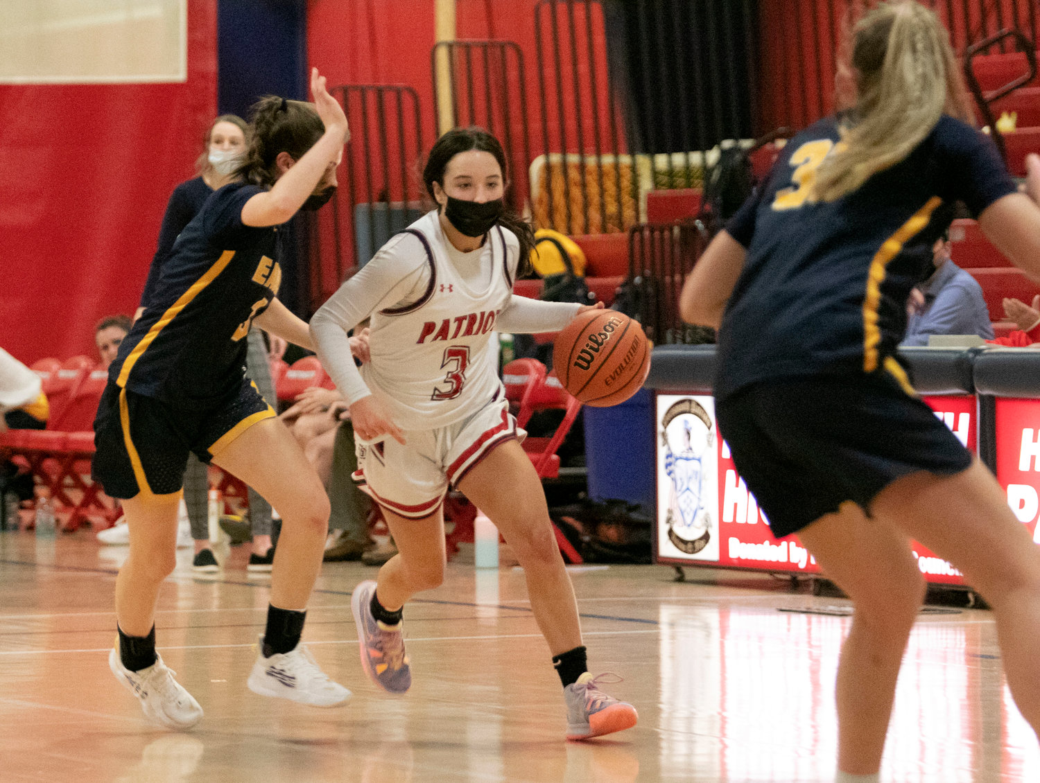 Portsmouth High’s Olivia Durant dribbles up court amidst a Barrington press during Monday night’s Division I home game.