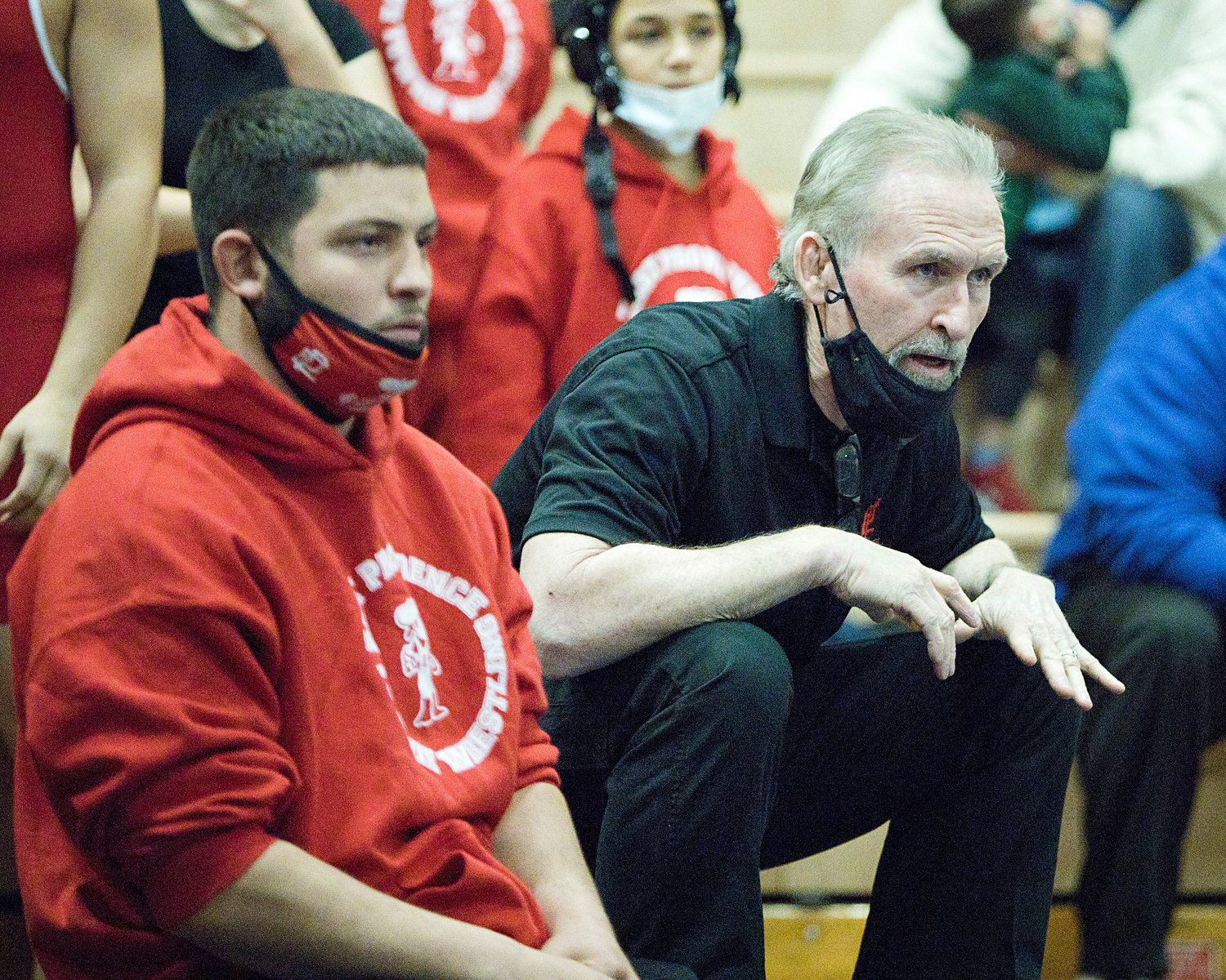 Head Coach Tom Galligan offers advice from the sidelines in Barrington.
